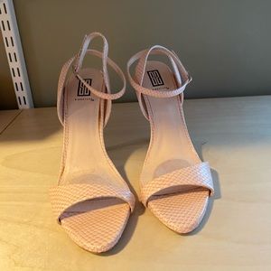 Pink snakeskin toe strap heels